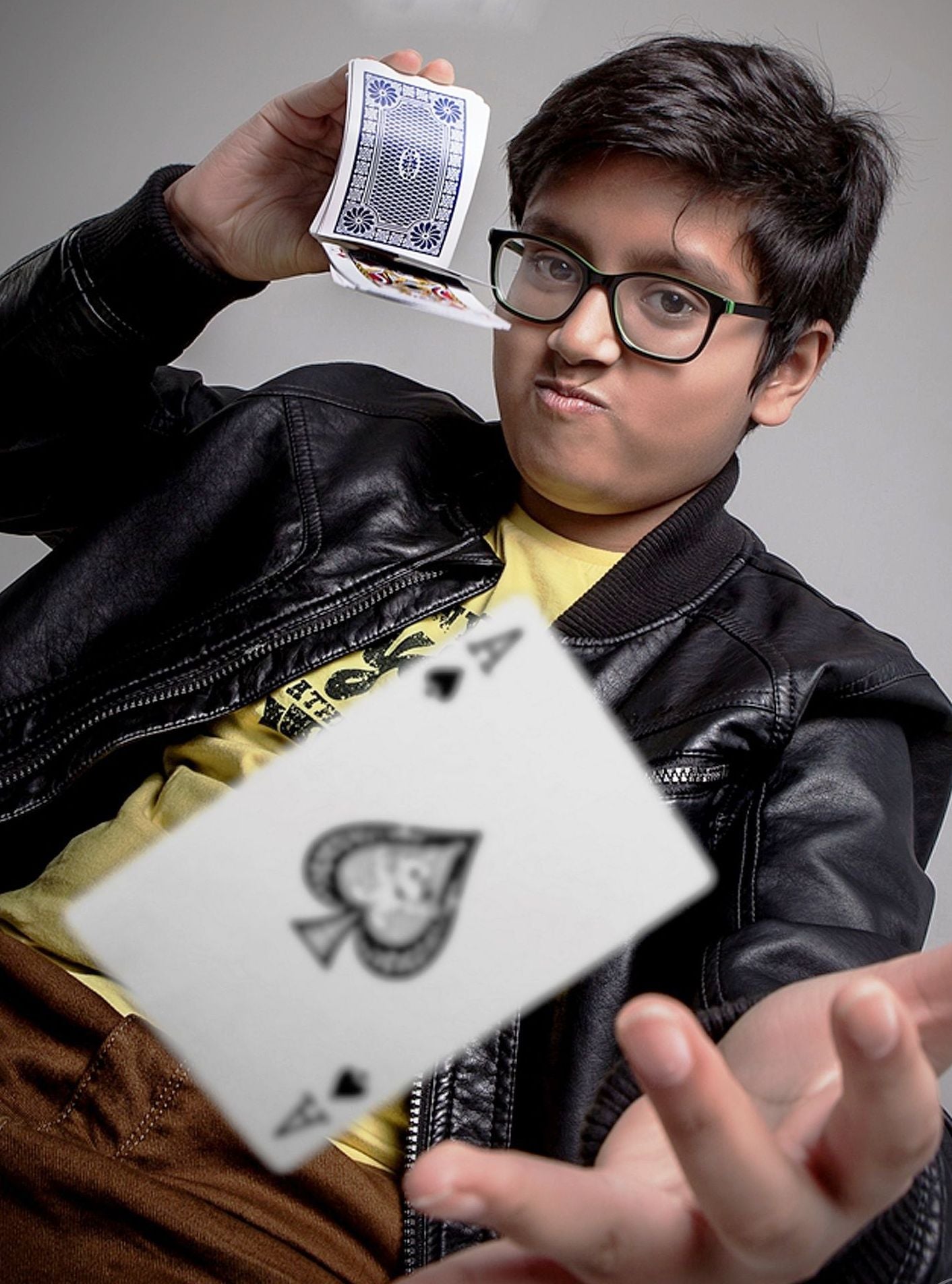 kid performing magic