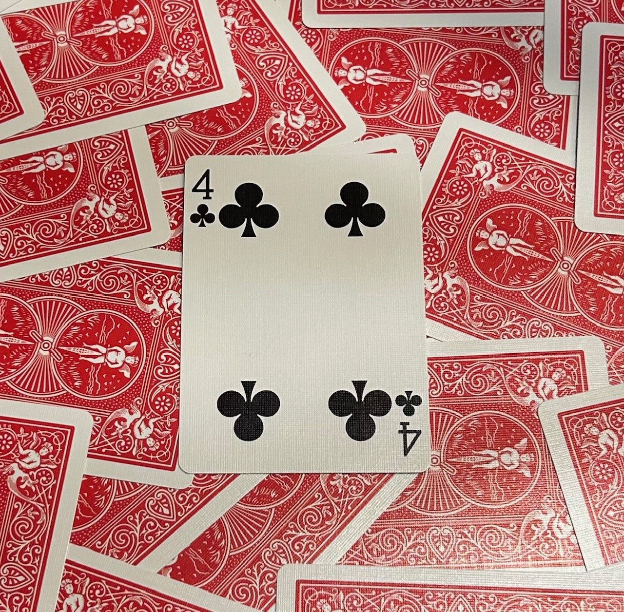 Red One-Way Forcing Deck - 4 of Clubs
