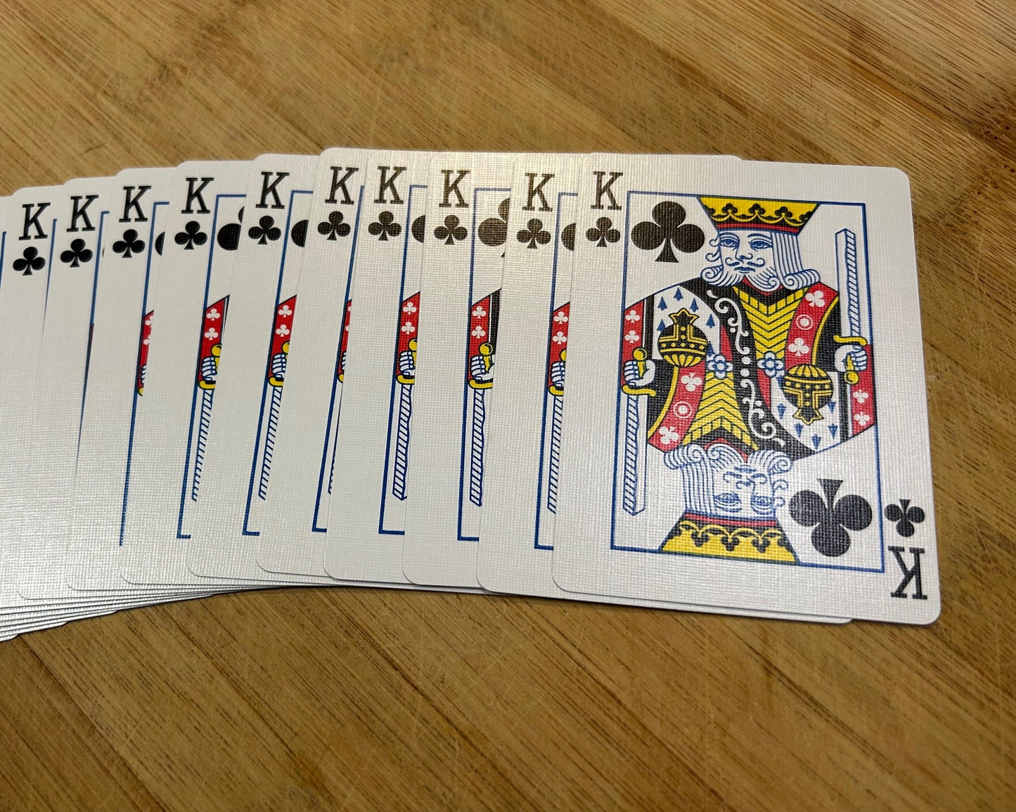 Red One-Way Forcing Deck - King of Clubs