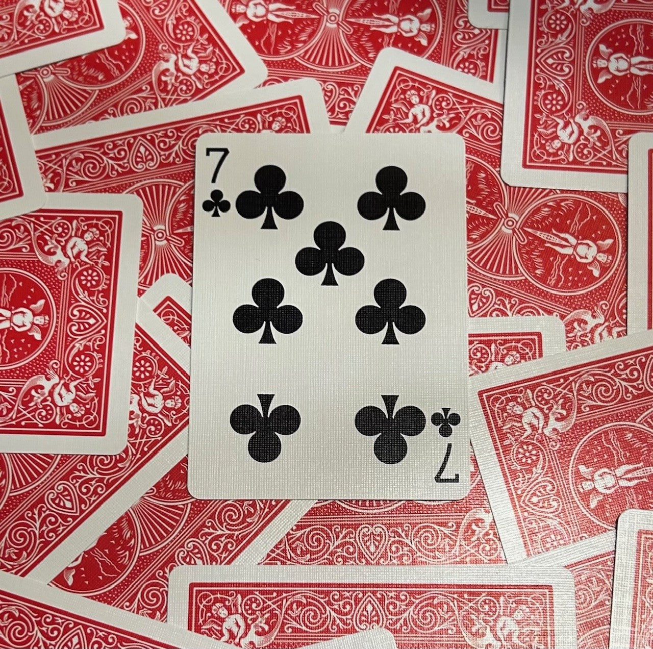 Red One-Way Forcing Deck - 7 of Clubs