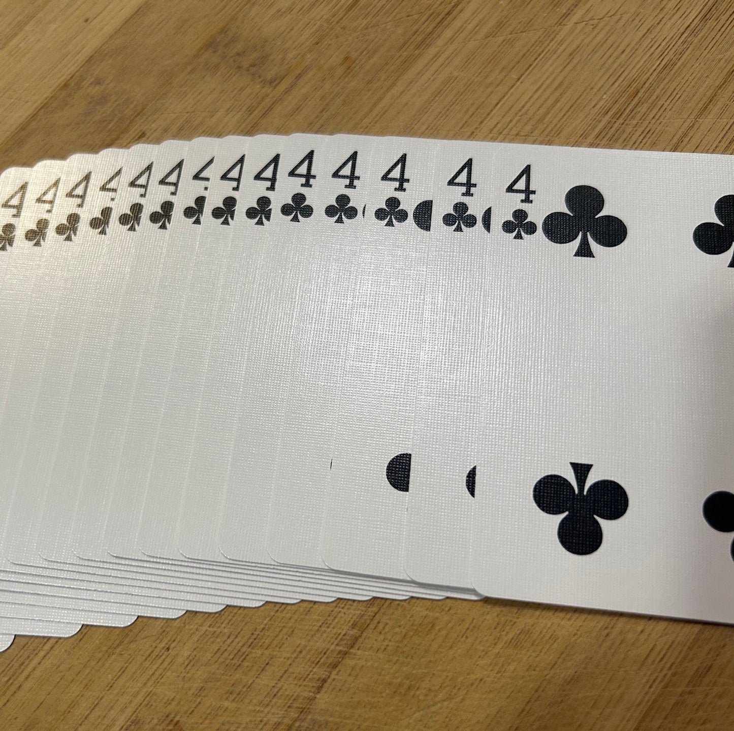 Red One-Way Forcing Deck - 4 of Clubs