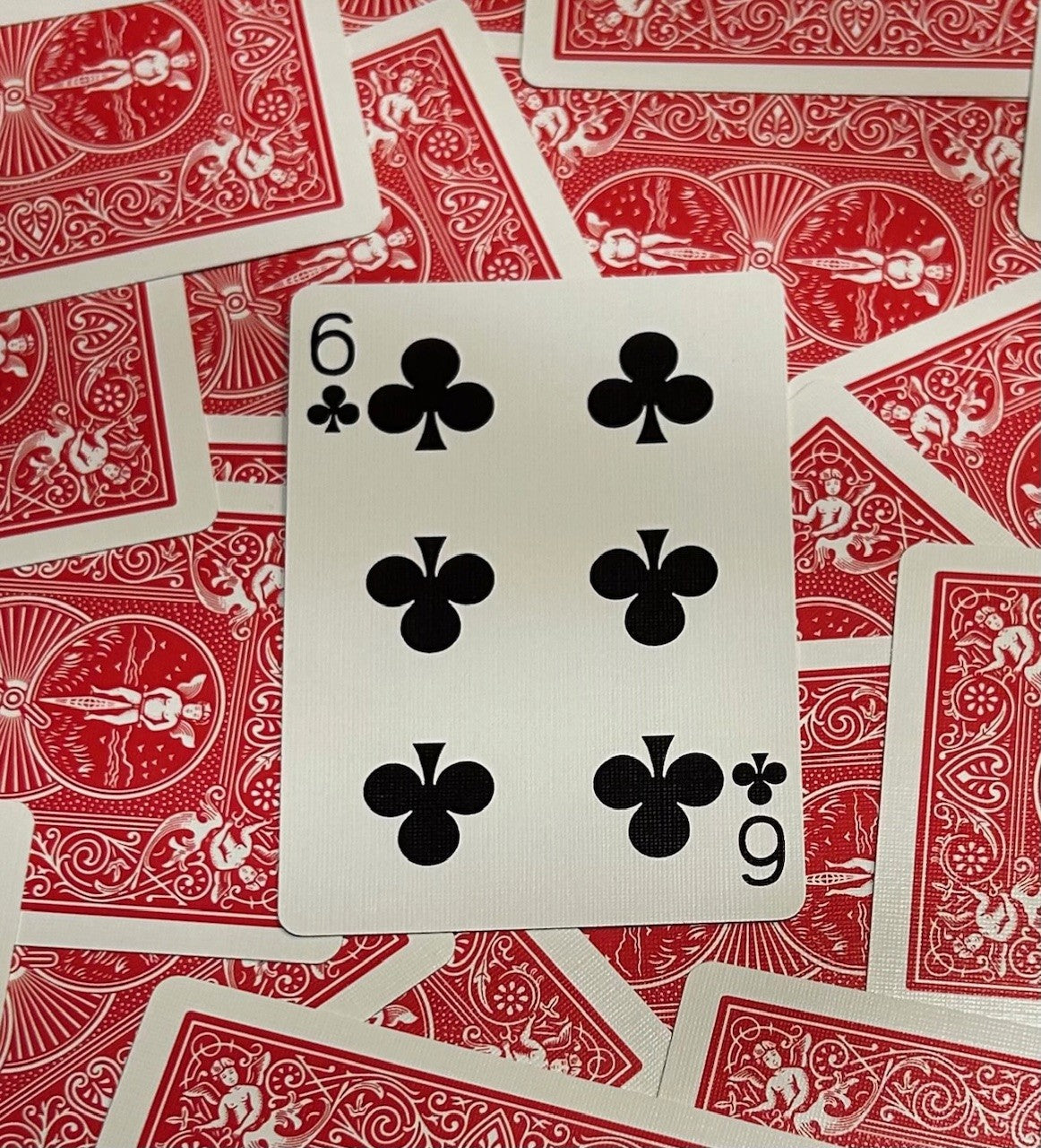 Red One-Way Forcing Deck - 6 of Clubs