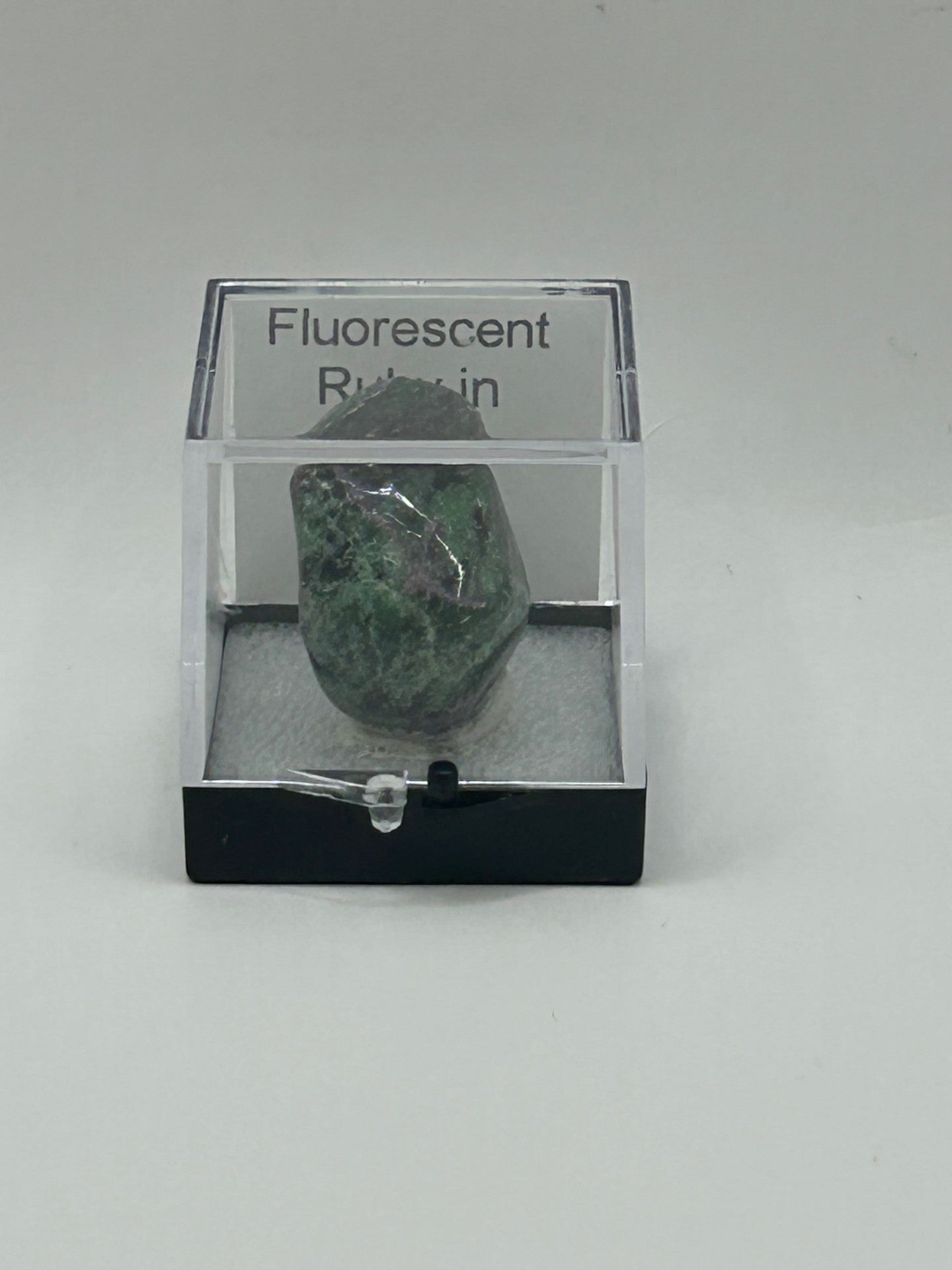 Fluorescent Ruby in Zoisite