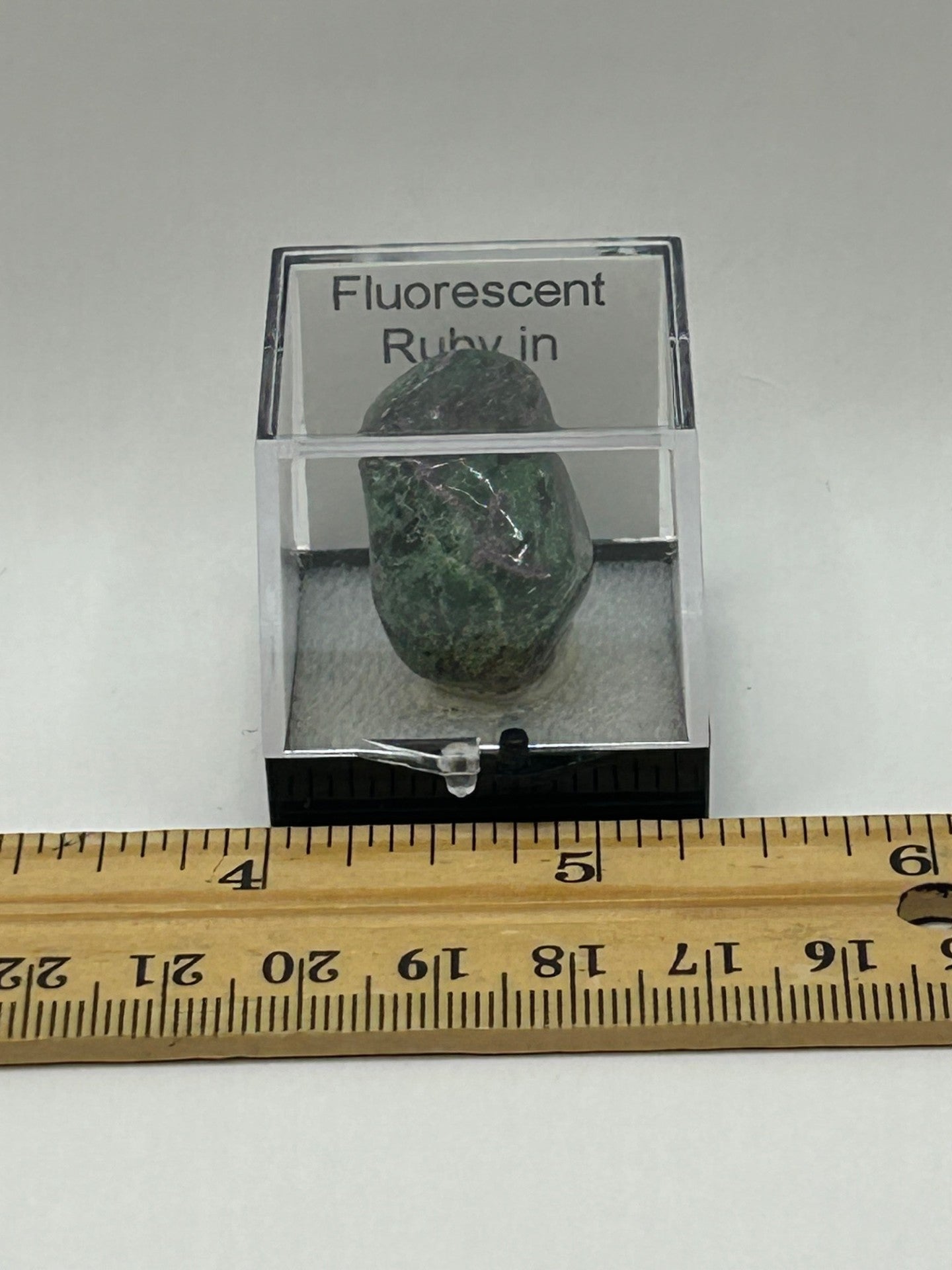 Fluorescent Ruby in Zoisite