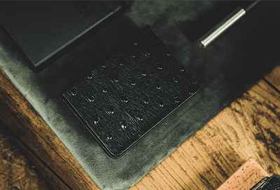 PlayingCardDecks.com-Ostrich Grain Dark Blue Leather Card Clip