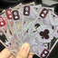PlayingCardDecks.com-Dragon Mighty Black Plastic Transparent Playing Cards
